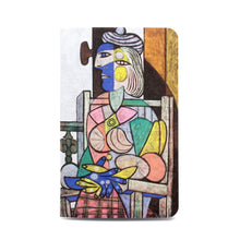 A6  Notebook - woman sitting in front of the  window